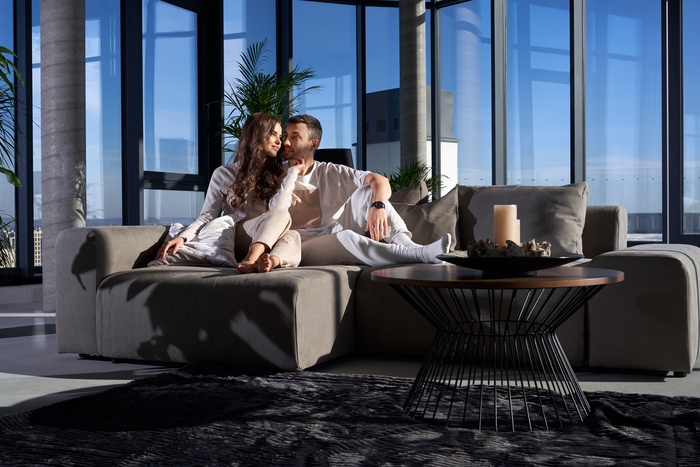 happy couple resting at home with a good mood