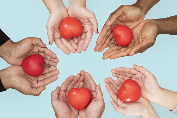 hands cupping heart love and relationships