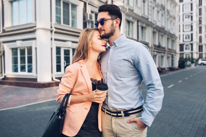 couple hugging in the street