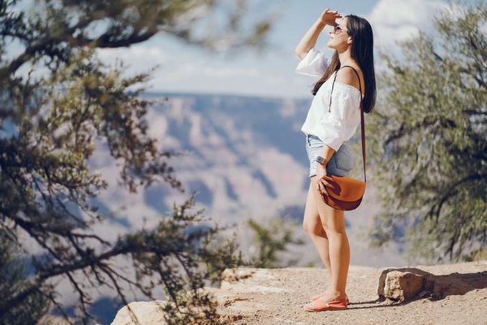 Elegant woman overlooking a Sequoia National Park trail near Visalia