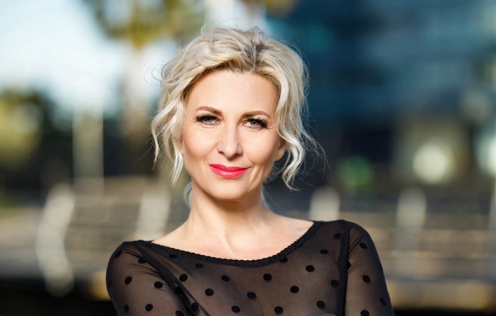 Rich woman in Latvia