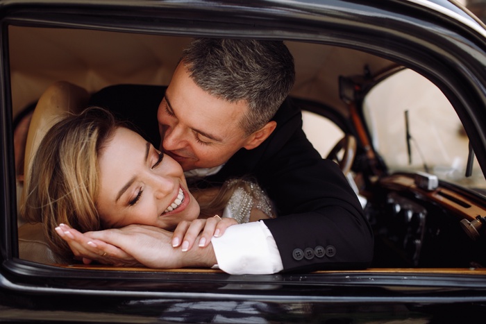 couple in car kissing