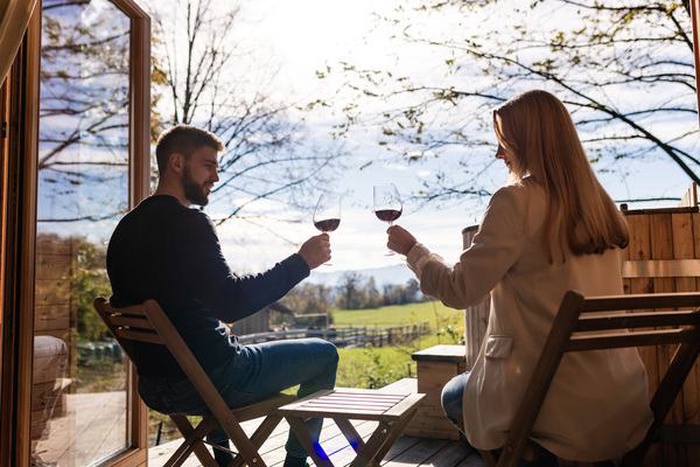 couple drinking wine on a terrace