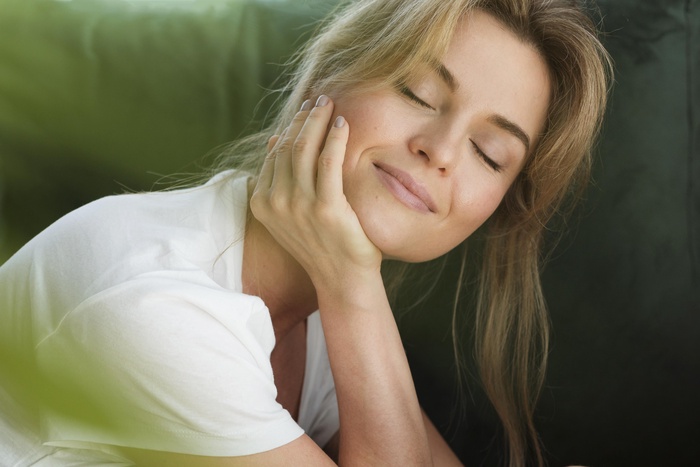 soft and gentle woman daydreaming