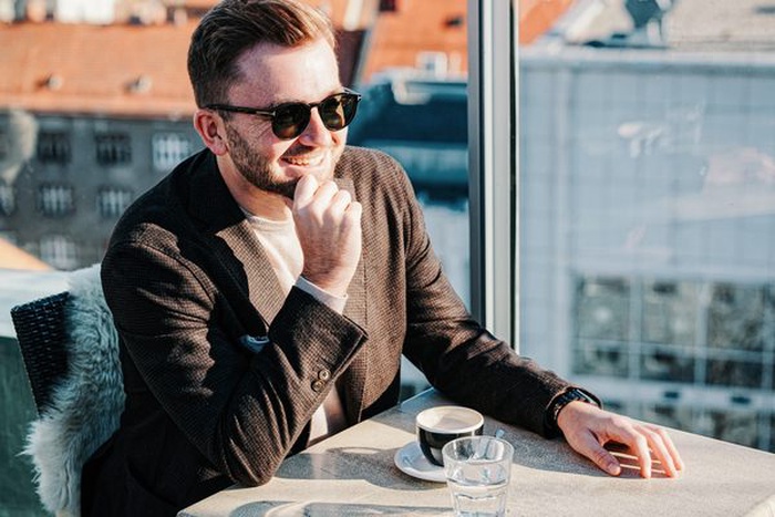 affluent man at an elegant Germantown restaurant
