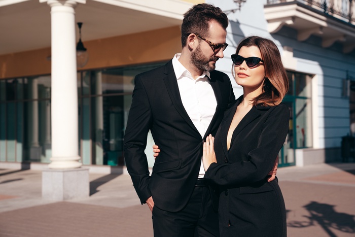 beautiful fashion woman her handsome elegant boyfriend black suit outdoors