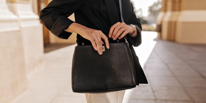 woman holding handbag