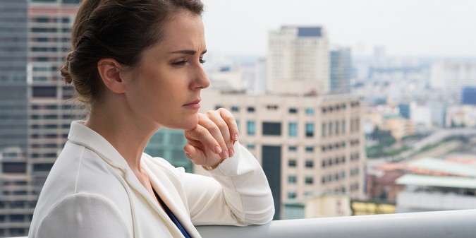 woman thinking on roof