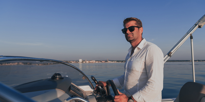 businessman with his luxury boat