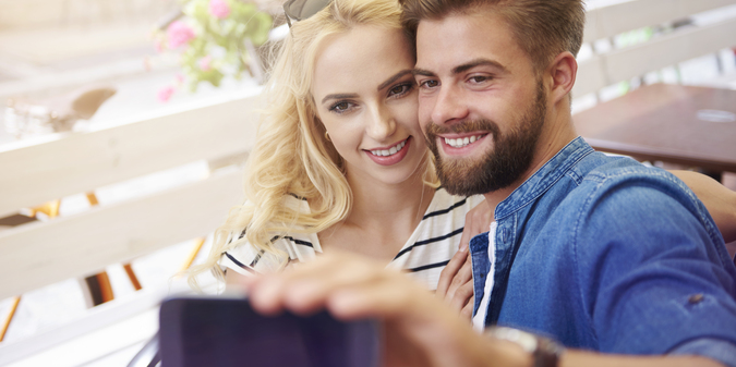 couple taking selfie
