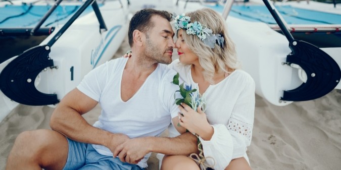Elegant couple enjoying upscale beach destination