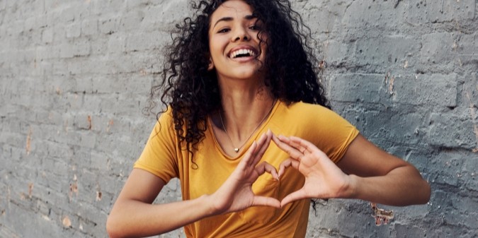 Confident woman embracing self-love in dating