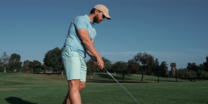 rich men playing golf