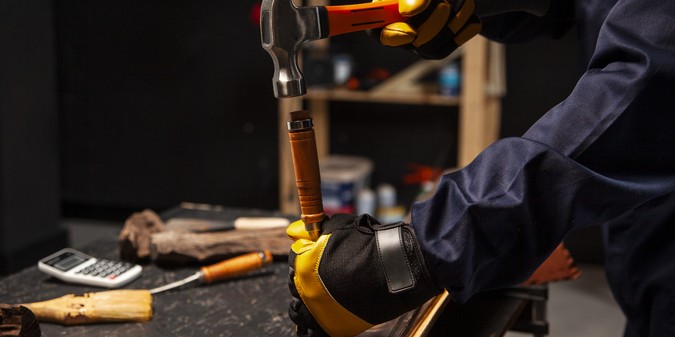 a blue collar woker is working