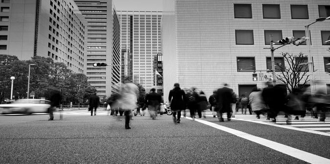 People walking on street in city