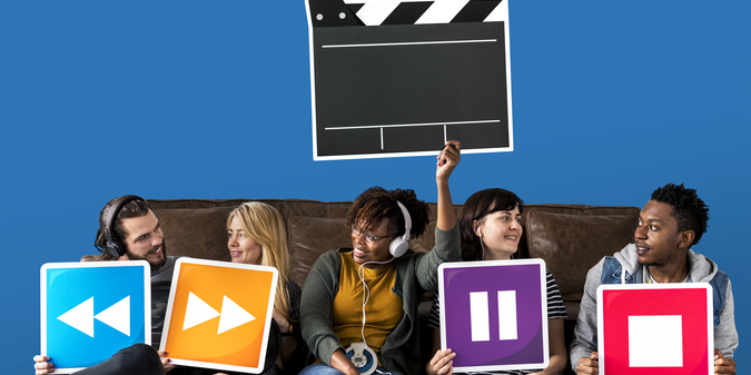 People holding media player icons and a clapper icon