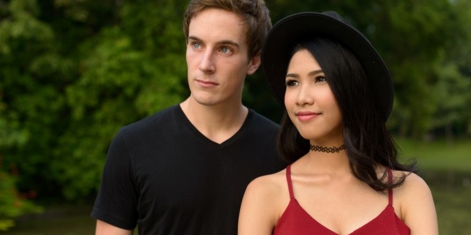 white man and asian woman, loving couple, charming